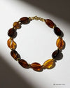 Collana Terre Brune Thrilly con perle ovali color ambra e marrone