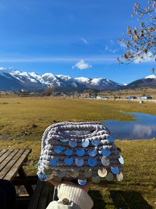 Borsa Étoile Grigia Thrilly tenuta in natura
